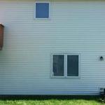 clean vinyl siding with soft washing service in west michigan